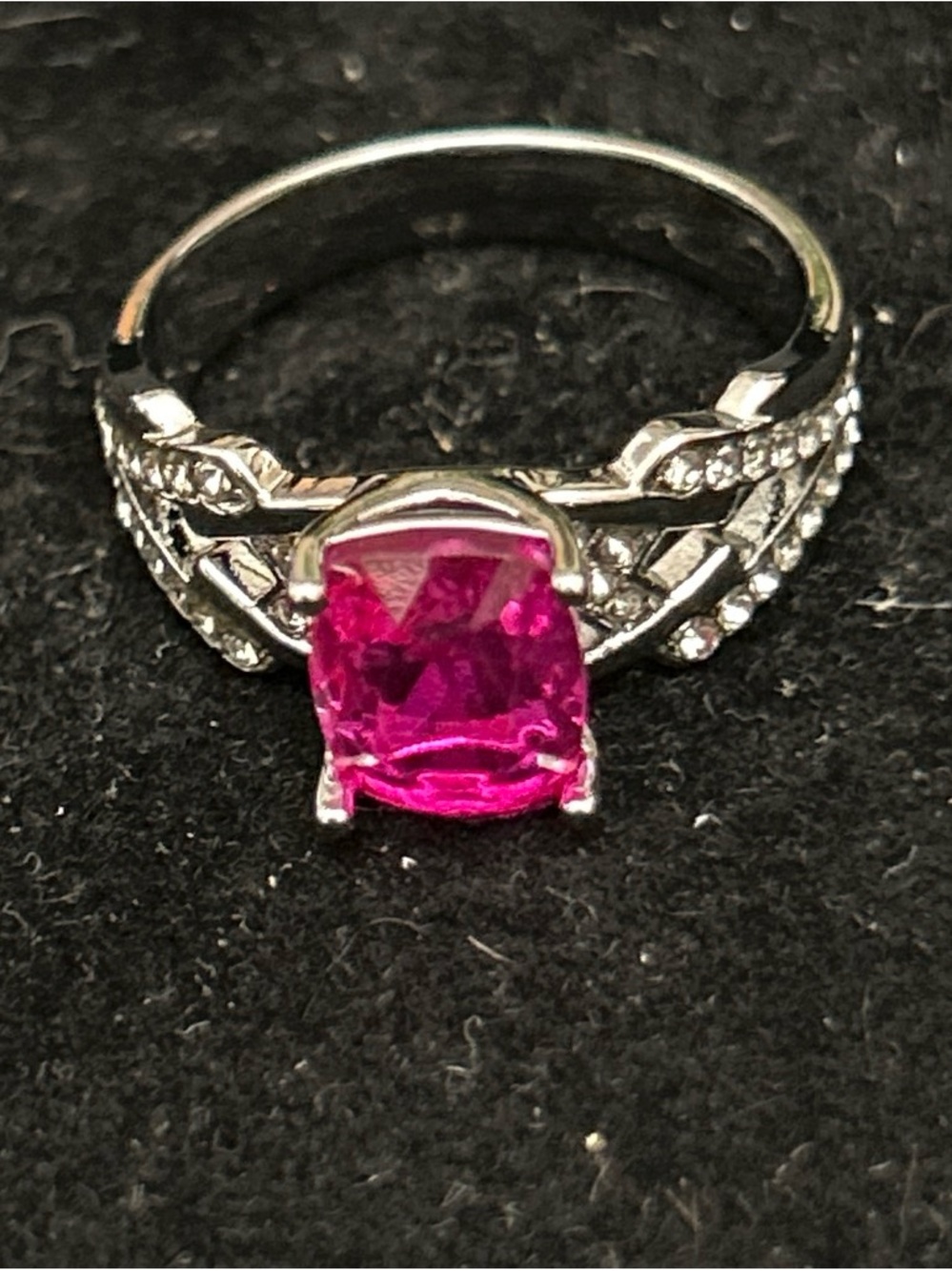 Silver color ring with pink stones